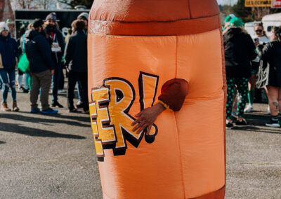 Participant dressed in a giant inflatable beer can costume at the 2025 Poulsbo Beer Run event.