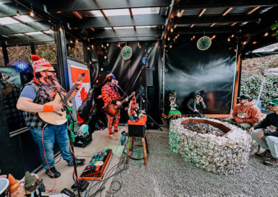 Crowd gathered near live music stage during the 2025 Poulsbo Beer Run in Poulsbo, Washington.
